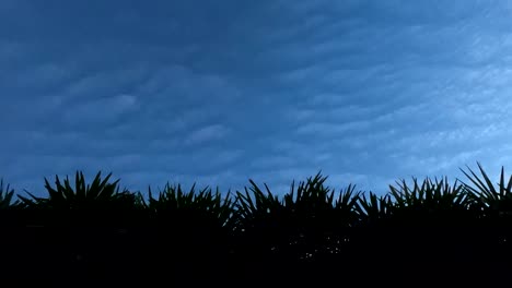 timelapse of clouds moving over at night