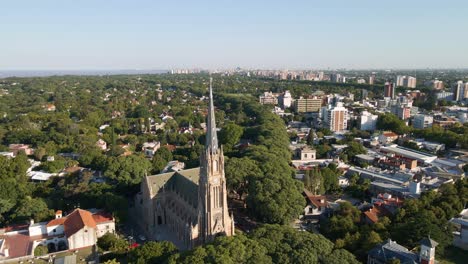 Aerial descending towards San Isidro Cathedral and Buenos Aires city on background