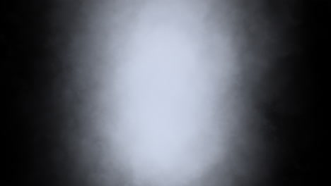 abstract front facing smoke fog coming from central point towards camera on black background. ideal for compositing using add and screen modes.