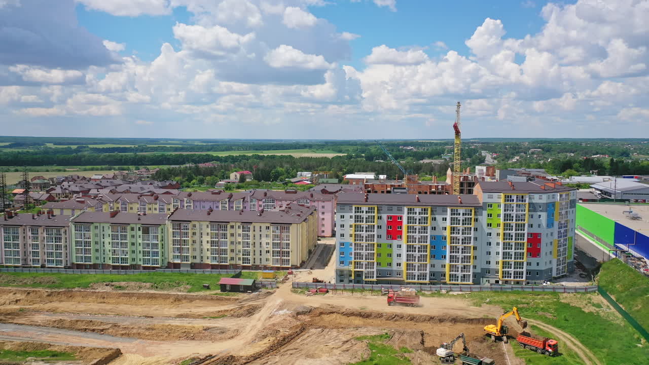 Flying over the construction site. Aerial drone view of large construction site