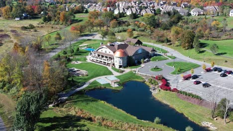 modern luxury mansion in drone reveal shot flying backward