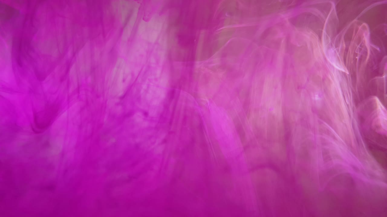 efecto de nube de nebulosa con tinta acrílica de gran colorido girando en el agua, fondo de color interesante y fascinante