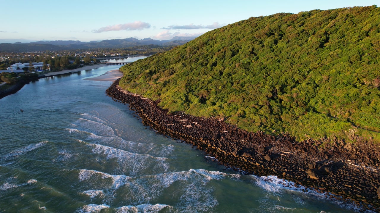 Tallebudgera Creek Mouth And Burleigh Heads National Park During Sunrise In QLD, Australia. - aerial pullback shot