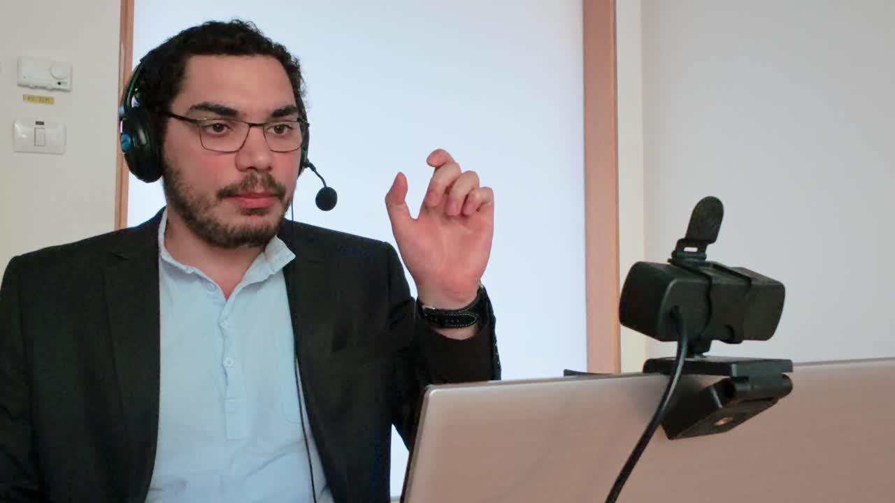 Man Participating in an Interactive Online Workshop