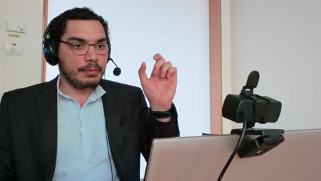 man participating in an interactive online workshop