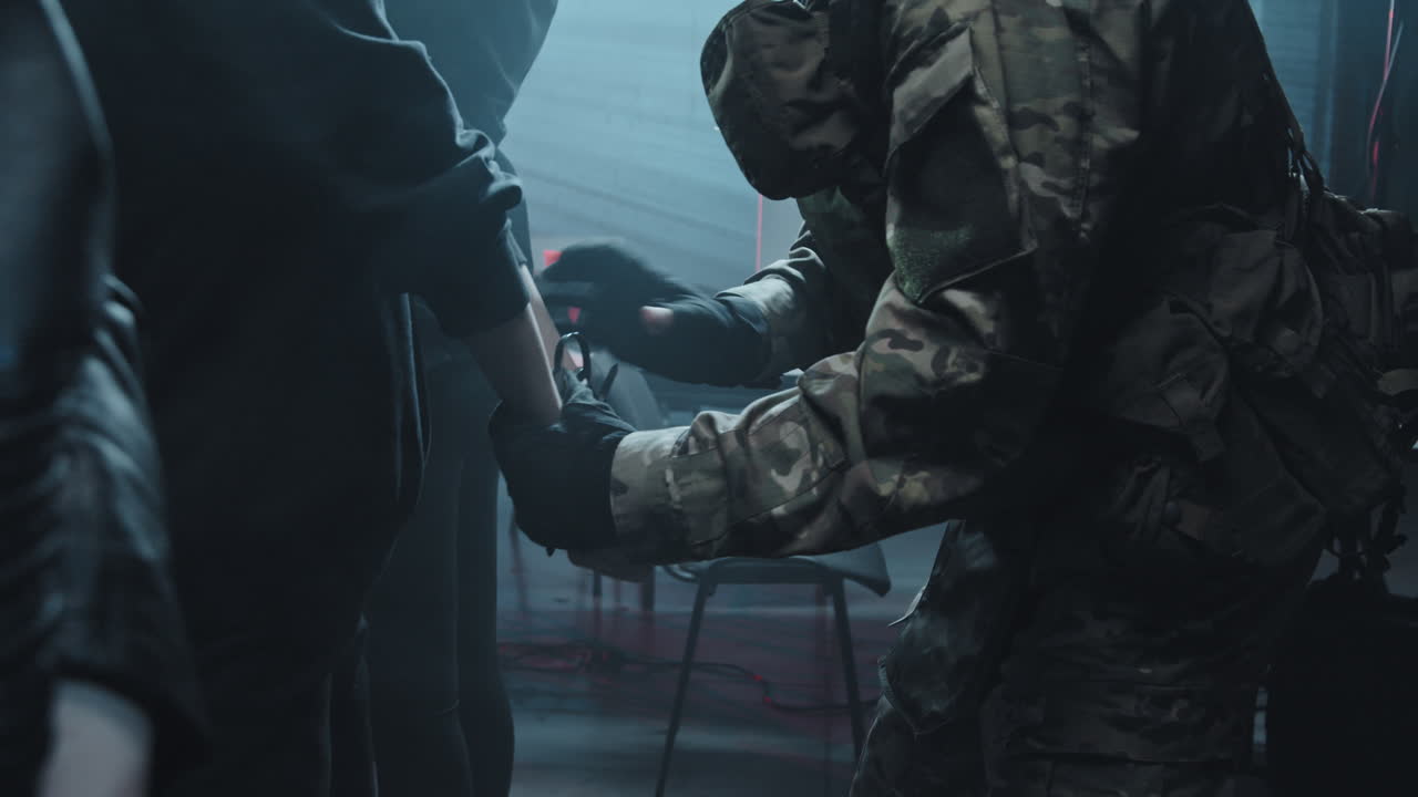 Special Forces Officer Arresting Criminals in Hideout