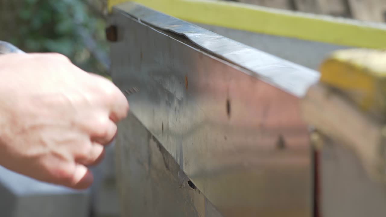 Boat Repair drill removing screws in stainless transom engine support