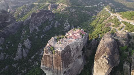 unreal aerial view of monastery of the holy trinity, incredible church architecture on top of the cliff