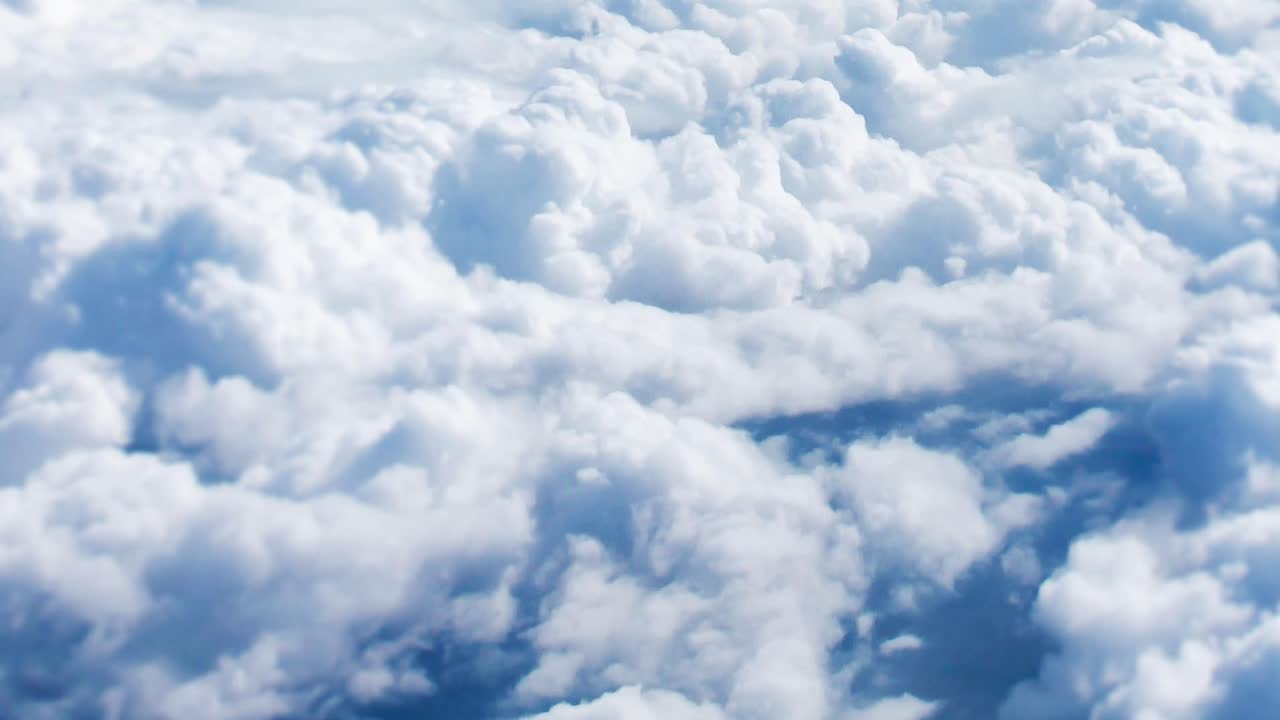 towards the white clouds in the clear sky