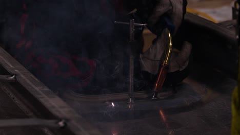 bright blue sparks from a welding machine in slow-motion