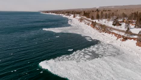 icy-cold water of lake superior with ice starting to melt on later part of winter in duluth, minnesota