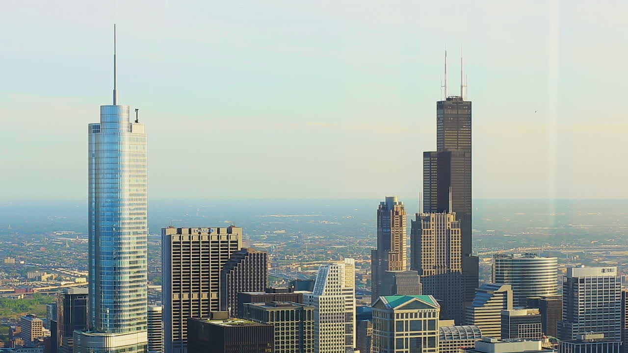 Downtown Chicago city Skyline from the 94th floor or the John Hancock Building. The Trump and Willis tower are shown.