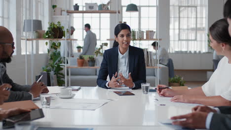 young-indian-business-woman-executive-meeting-corporate-leaders-discussing-development-ideas-with-shareholders-brainstorming-in-office-boardroom