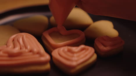 heart-shaped cookies with pink icing