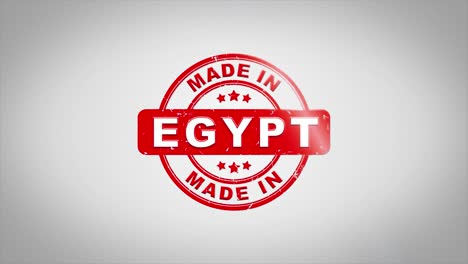 hecho en egipto firmado estampado texto animación de sello de madera. tinta roja en papel blanco limpio fondo de superficie con fondo matte verde incluido.