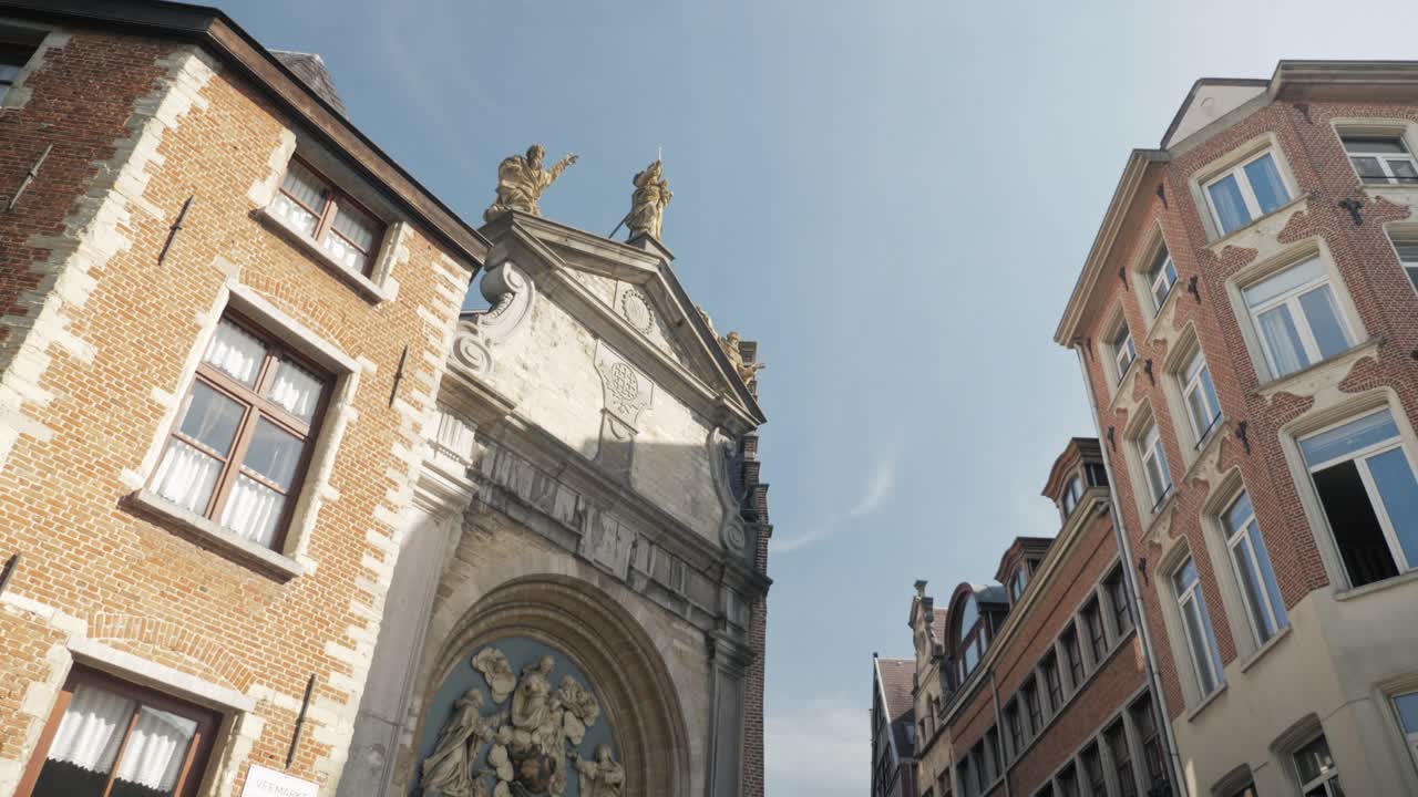 Push-in gimbal shot of the Baroque portal at Sint Paulus Church in Antwerp