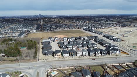 aerial view of a modern suburban community in calgary, canada, in spring after the snow melt