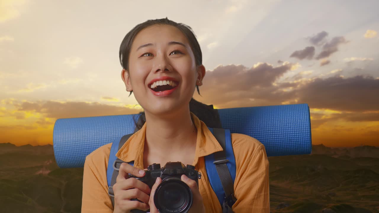 Happy Female Traveler with Camera at Sunset