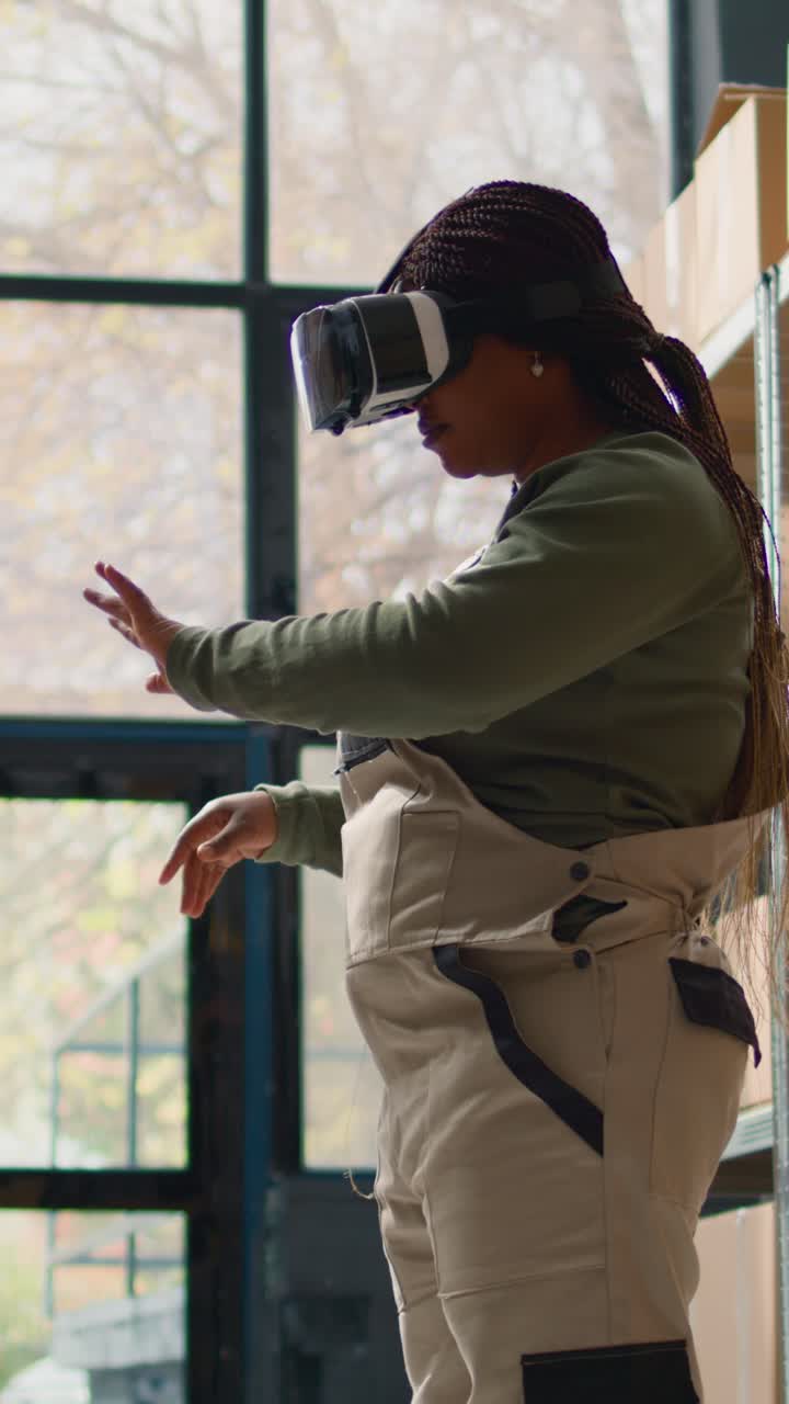 Vertical video Manager in warehouse wearing VR headset