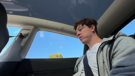 person sitting in a car