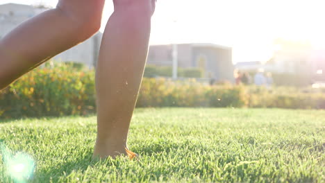 barefoot walk on grass in a park