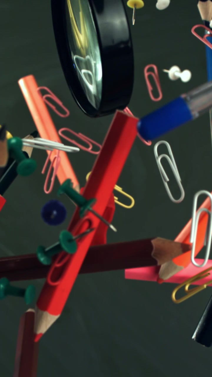 Assortment of Colorful School and Office Supplies Floating in Air