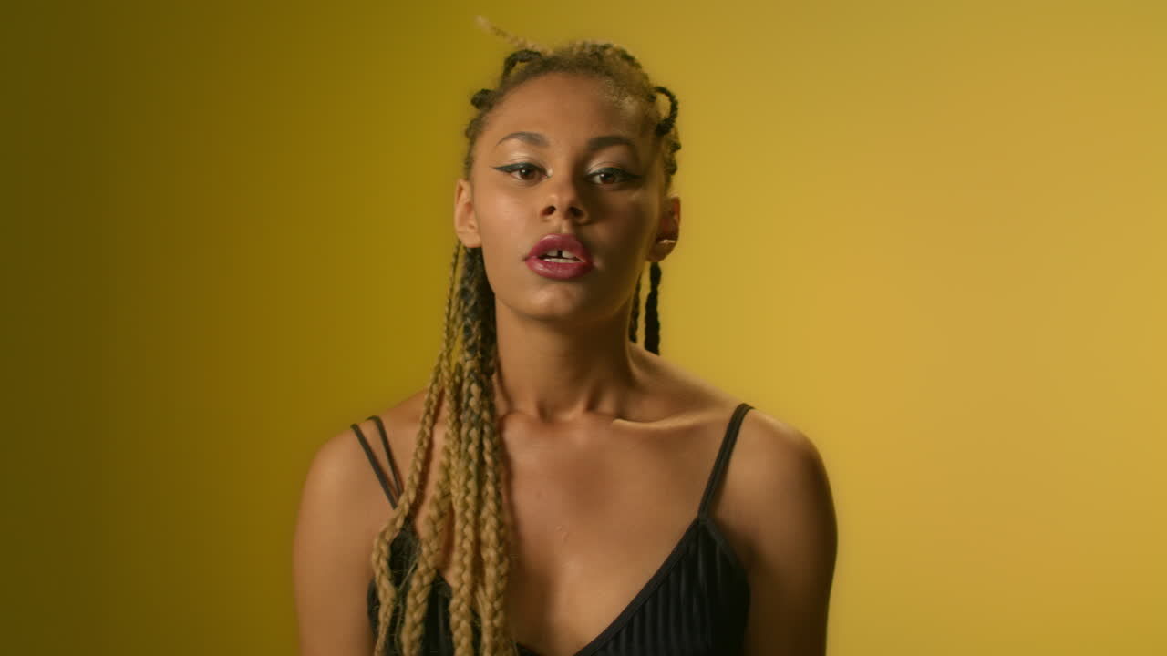 Aggressive woman african ethnicity looking with rage and anger in camera