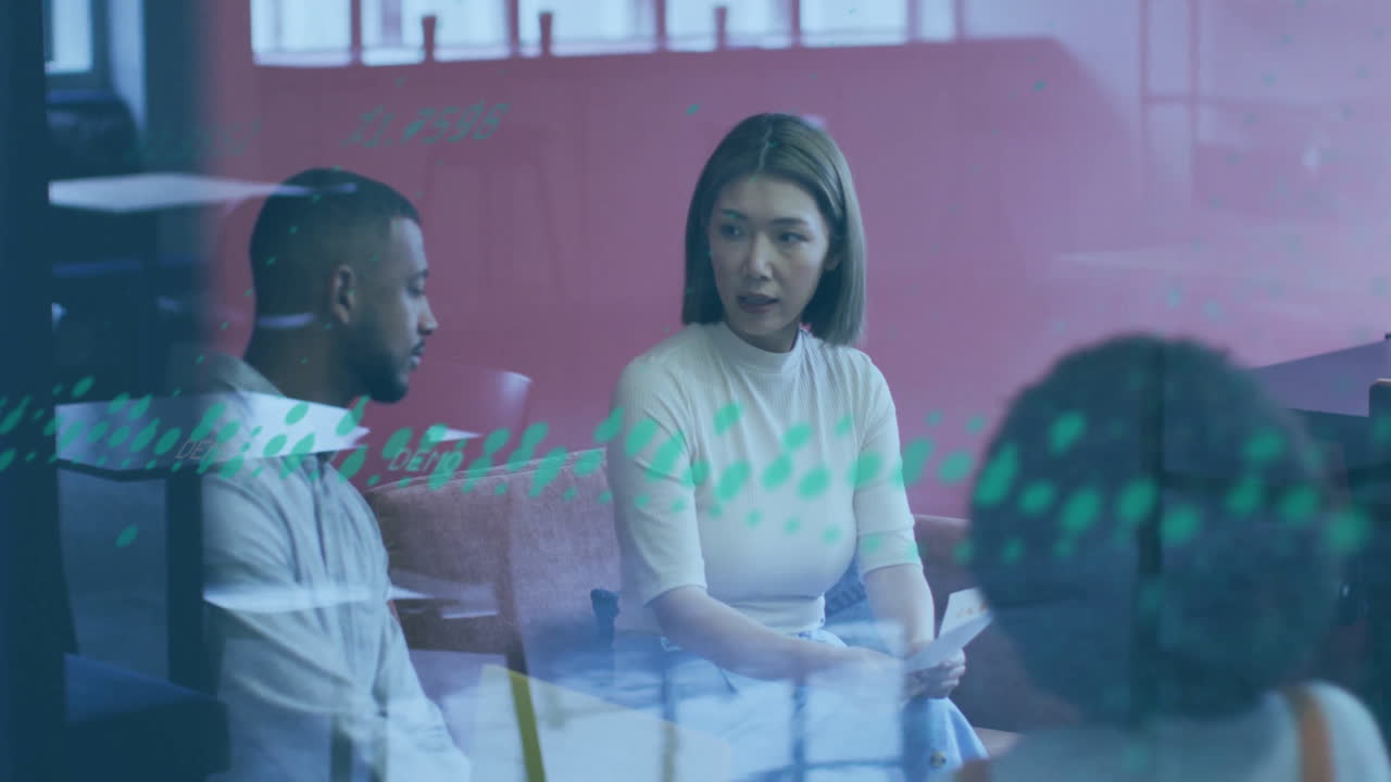 In office, diverse colleagues discussing animation over digital data during meeting