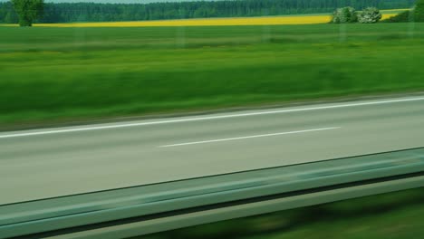 travel by car-view of a quality motorway and green fields