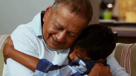 Grandfather-and-grandson-embracing-each-other