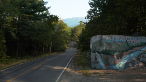 Beautiful-forward-moving-tracking-shot-of-Pockwockamus-rock