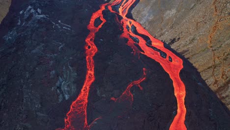 Red-Lava-Flow-From-Volcanic-Eruption-At-Mount-Fagradalsfjall,-Southwest-Iceland---aerial-shot