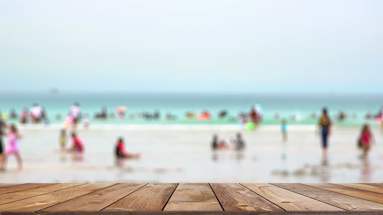 Wood shelf table with blurred sea beach on clouds blue sky background. product display template design