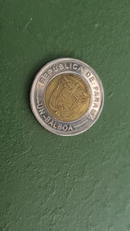 vertical view of one balboa, national currency of panama, close up