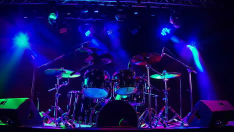 drums on stage with colorful stage lights