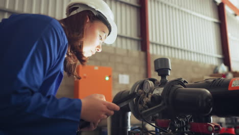 woman, inspection and machine check or smartphone