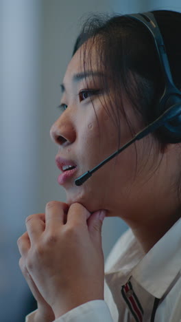 woman concentrating on customer service call