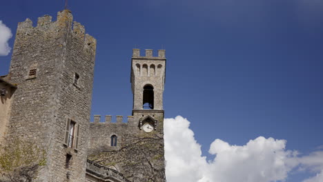 medieval stone castle tower with clock