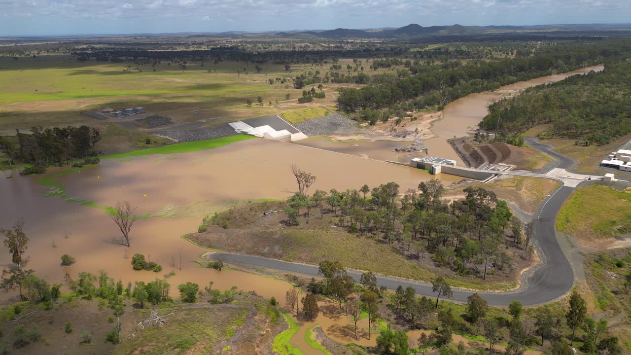 Right to left aerial views over Rookwood Weir and the Fitzroy River, West of Rockhampton, Central Queensland, Australia.