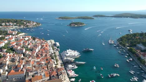 aerial view of paklinski islands with boats docked along the coast, hvar, croatia