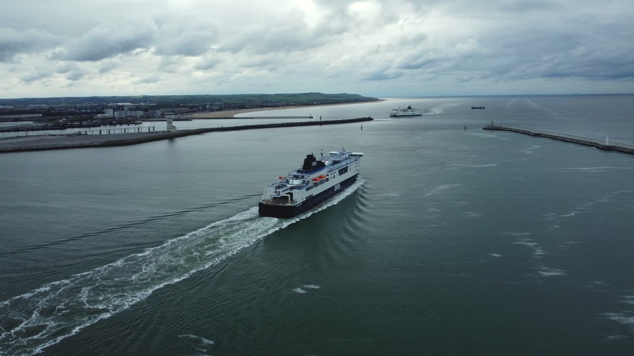 Ferry in a harbor under cloudy sky