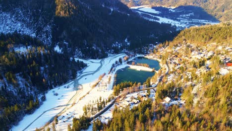 aerial 4k drone footage of lake jasna, slovenia in the winter