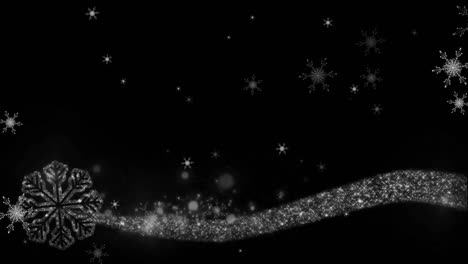 animation of snow falling on black background at christmas