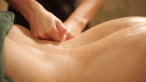 professional massage therapist performing relaxation massage