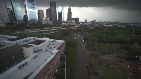 Wide-angle-drone-view-of-downtown-Houston,-Texas-on-a-dark-cloudy-day