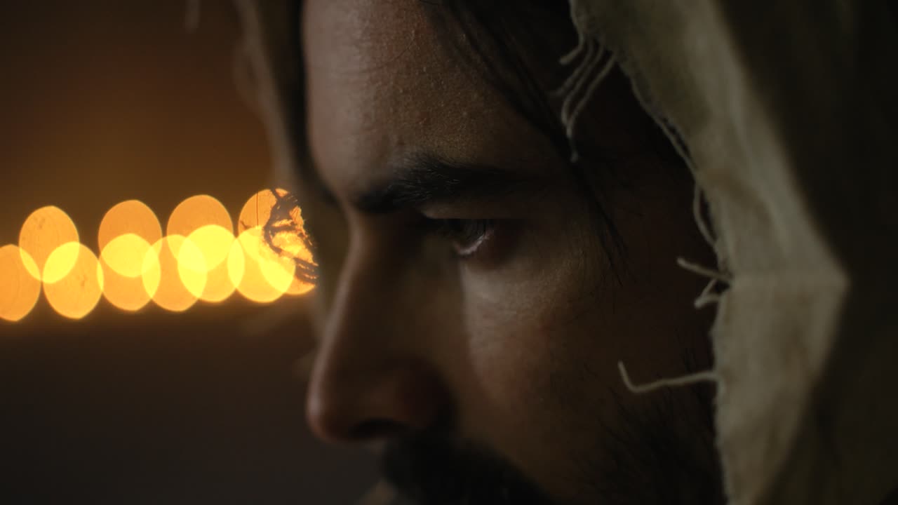 Closeup of Eyes of Jesus Christ in Ambient Light for Christianity stock footage
