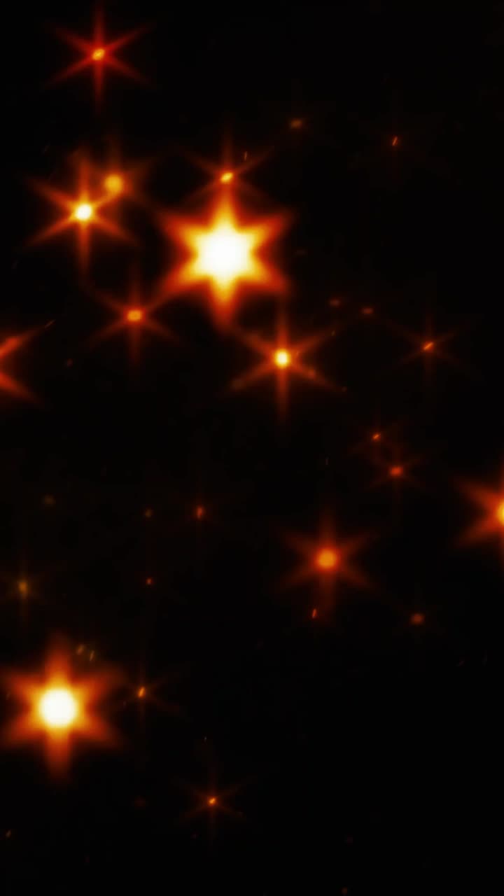 Magiche luci a stella arancioni scintillanti su sfondo scuro
