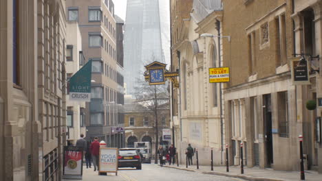 london street scene with the shard in the background