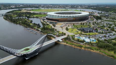 aerial view from drone looking over matagarup bridge in perth, wa