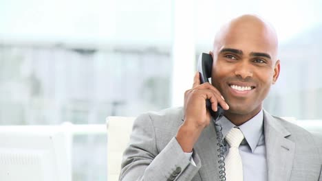 -Assertive-businessman-on-phone